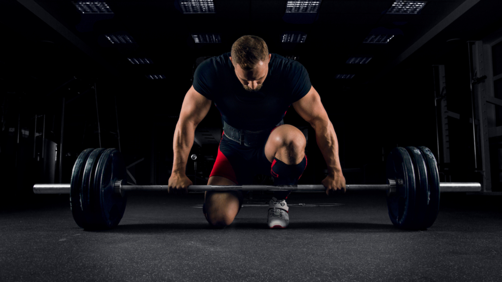 Athlete,Is,Standing,On,His,Knee,And,Near,The,Bar